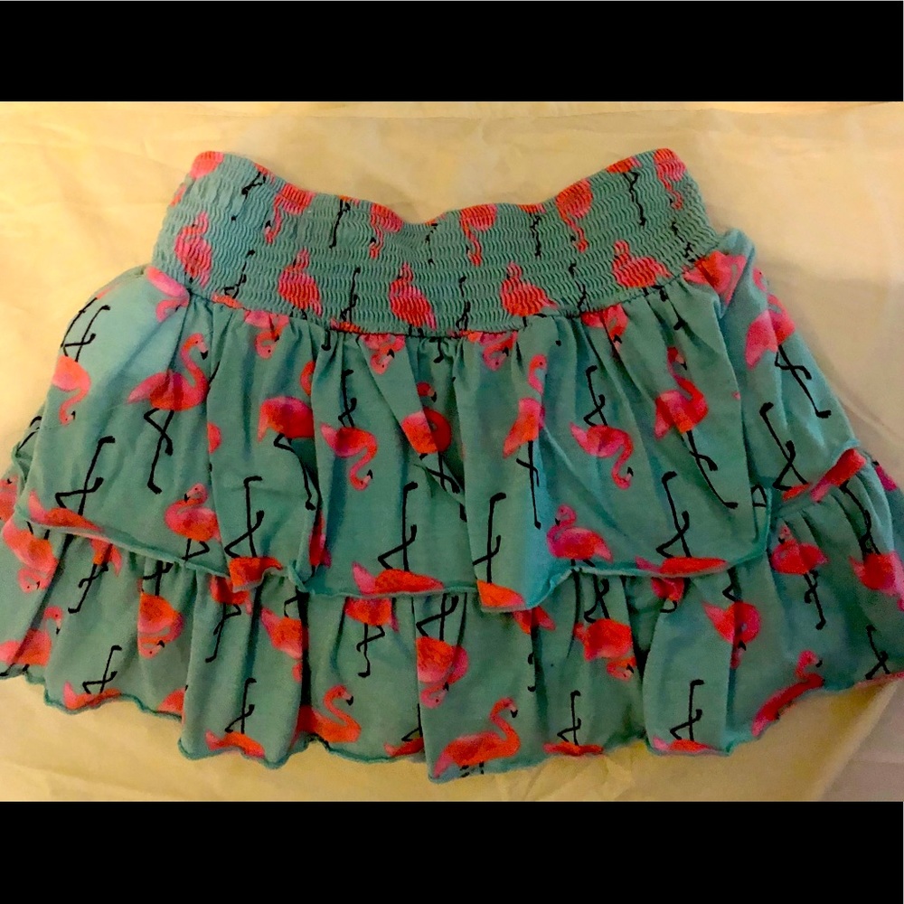 Justice girl’s ruffle skirt w/shorts underneath.